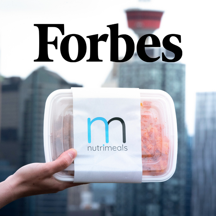 Nutrimeals container against Calgary city backdrop