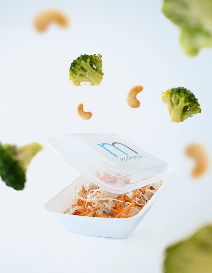 meal with pieces of broccoli and cashews around it