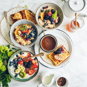 a spread of healthy breakfast with fresh berries 