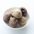 Snack of almost bites shaped in balls in white dish